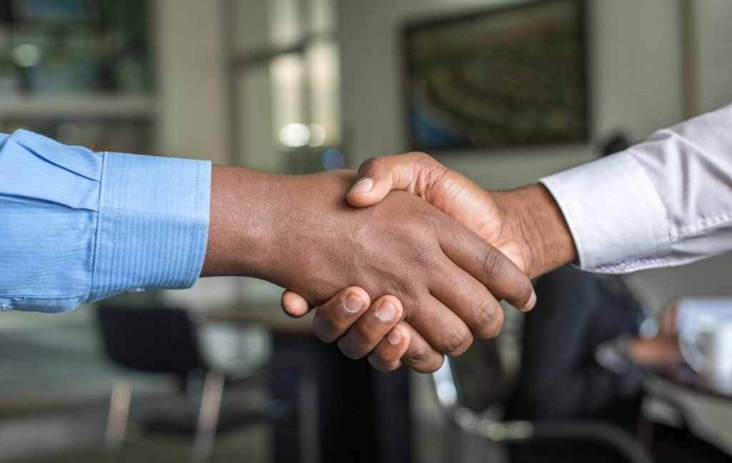 Business partners shaking hands after a consultation